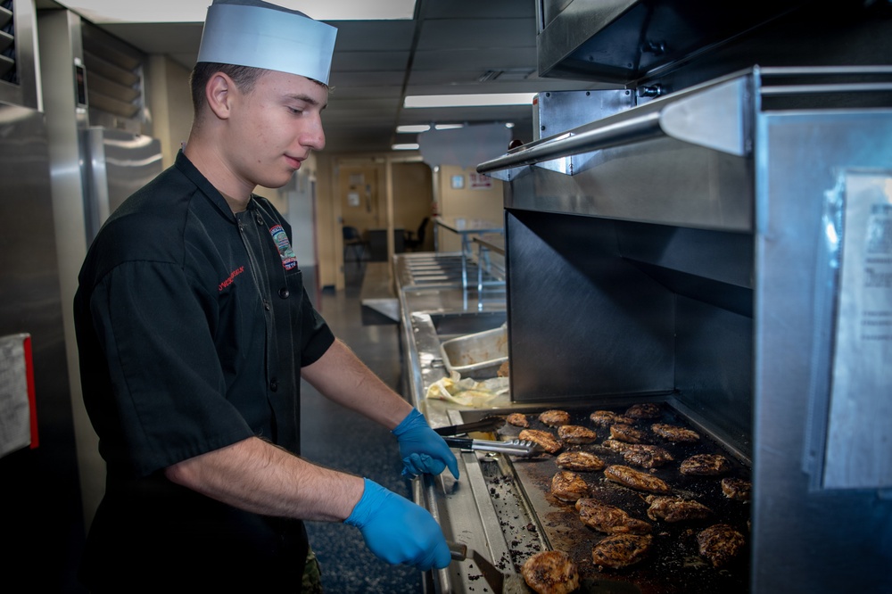 USS Ronald Reagan (CVN 76) Sailors Prepare Food in the Galley