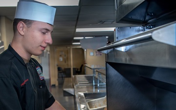 USS Ronald Reagan (CVN 76) Sailors Prepare Food in the Galley