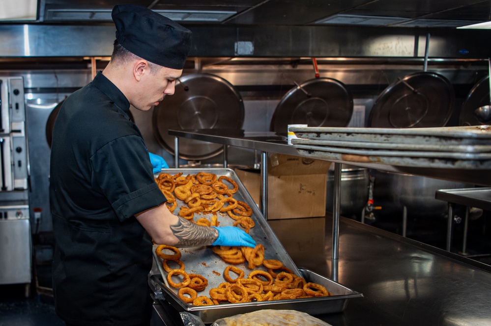 USS Ronald Reagan (CVN 76) Sailors Prepare Food in the Galley