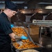 USS Ronald Reagan (CVN 76) Sailors Prepare Food in the Galley