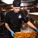 USS Ronald Reagan (CVN 76) Sailors Prepare Food in the Galley