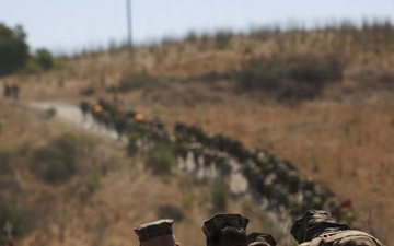 9th Communication Battalion conducts a six-mile hike
