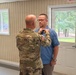 U.S. Army Chief Warrant Officer 5 (Ret.) James Robinson, South Carolina National Guard, receives the Legion of Merit.