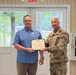 U.S. Army Chief Warrant Officer 5 (Ret.) James Robinson, South Carolina National Guard, receives the Legion of Merit.