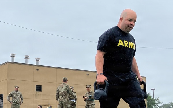 Observer/Controller Trainer Executes Kettlebell Carry During ACFT at West Fort Hood