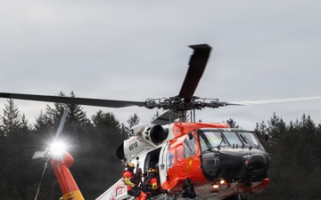 Aircrews from Coast Guard Air Station Kodiak participate in search and rescue demonstration