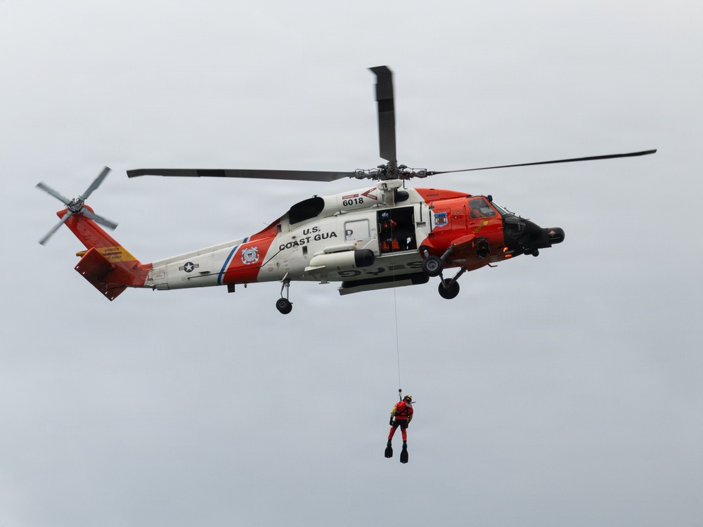Aircrews from Coast Guard Air Station Kodiak participate in search and rescue demonstration