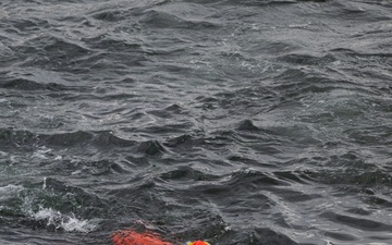 Aircrews from Coast Guard Air Station Kodiak participate in search and rescue demonstration