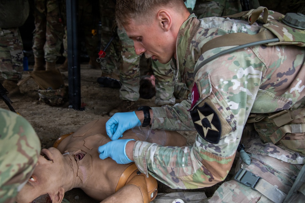 Soldiers Participate in the EFMB portion During E3B Testing