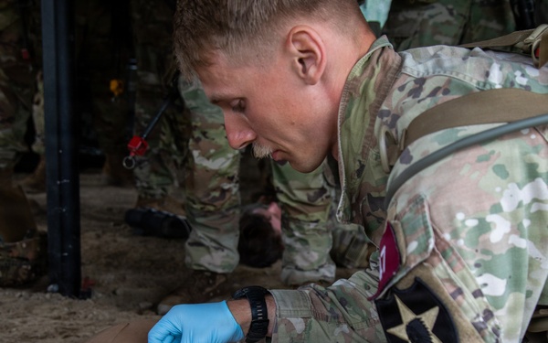 Soldiers Participate in the EFMB portion During E3B Testing