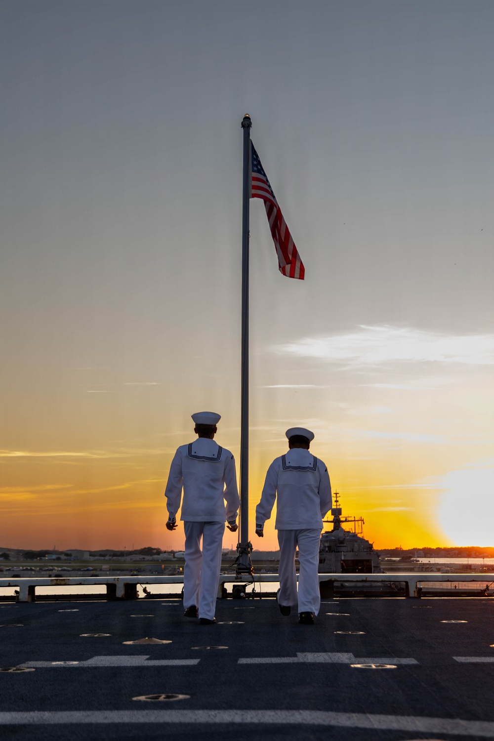 LCF-24: U.S. Sailors aboard LPD 28 conduct evening colors