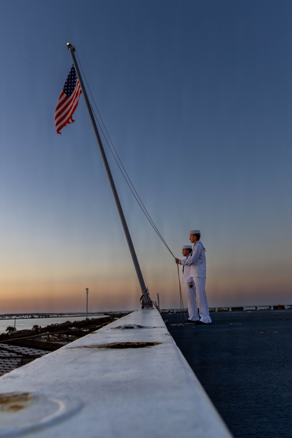 LCF-24: U.S. Sailors aboard LPD 28 conduct evening colors