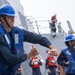 USS Mustin conducts a replenishment-at-sea with USNS Alan Shepard