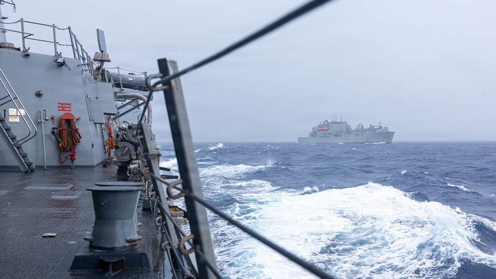 USS Mustin conducts a replenishment-at-sea with USNS Alan Shepard