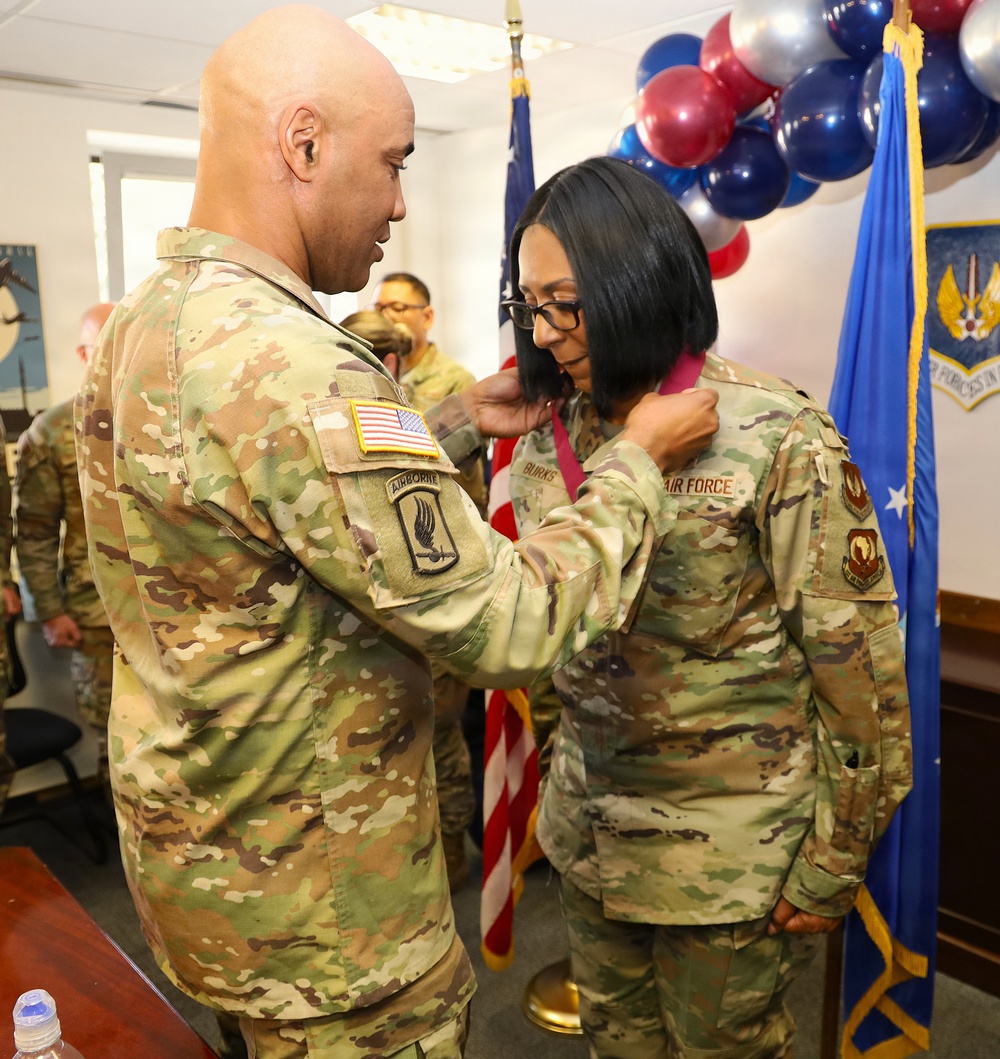 Army Officer Pins Medal on Air Force Airman During Award Ceremony