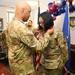 Army Officer Pins Medal on Air Force Airman During Award Ceremony