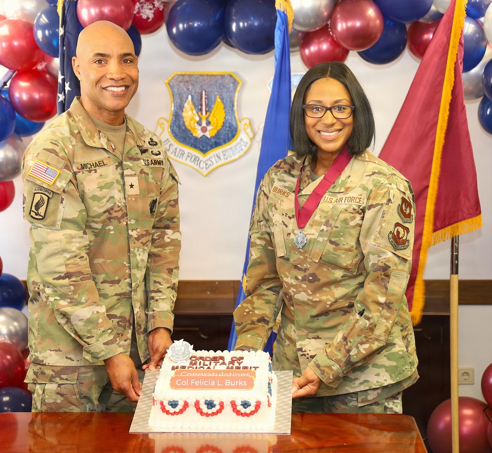 U.S. Army Brigadier General Presents Order of Military Merit to U.S. Air Force Col. Felicia L. Burks at USAFE Ceremony