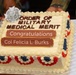 Celebration cake honoring Col. Felicia L. Burks for Order of Military Medical Merit induction