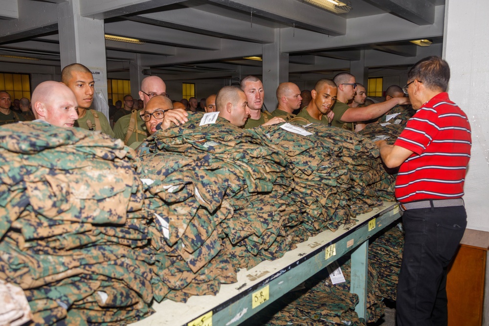 U.S. Marine Officer Candidates with OCS conduct Initial Uniform Issue