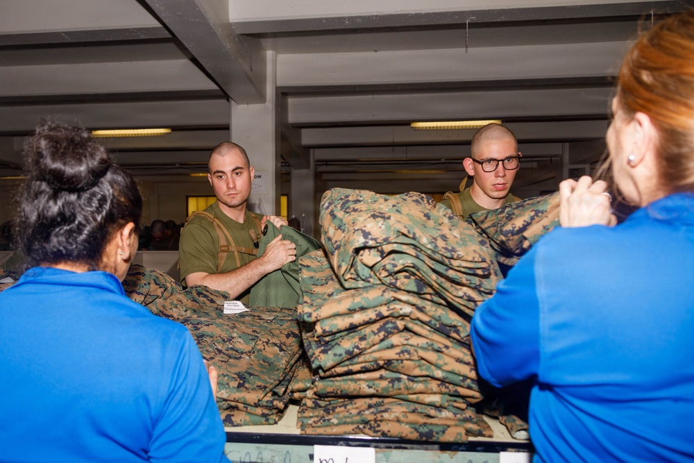 U.S. Marine Officer Candidates with OCS conduct Initial Uniform Issue