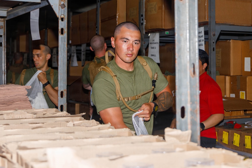 U.S. Marine Officer Candidates with OCS conduct Initial Uniform Issue
