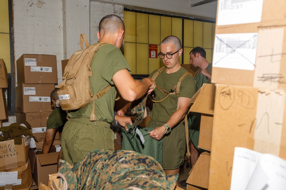 U.S. Marine Officer Candidates with OCS conduct Initial Uniform Issue