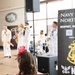 Navy Band Northeast’s Jack Tar Brass Band performs at Hershey Park Chocolate World during Harrisburg Navy Week.