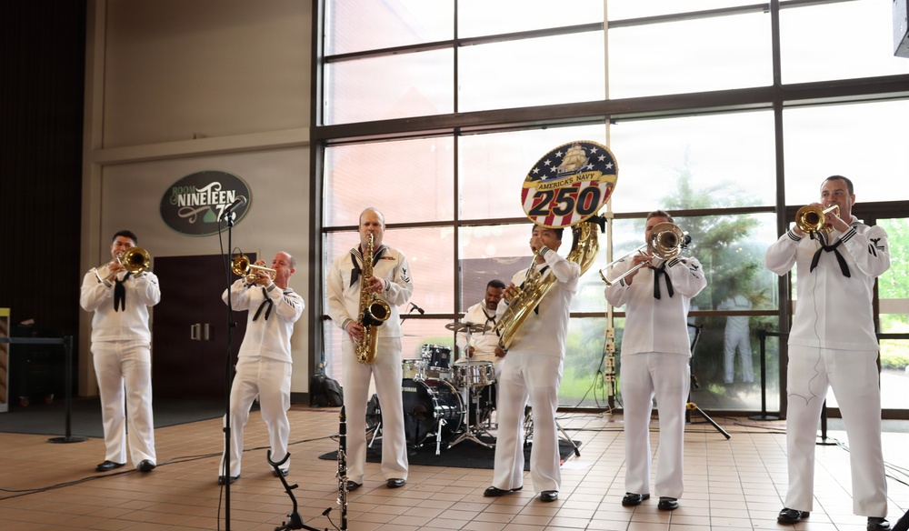 Navy Band Northeast’s Jack Tar Brass Band performs at Hershey Park Chocolate World during Harrisburg Navy Week.