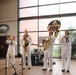 Navy Band Northeast’s Jack Tar Brass Band performs at Hershey Park Chocolate World during Harrisburg Navy Week.
