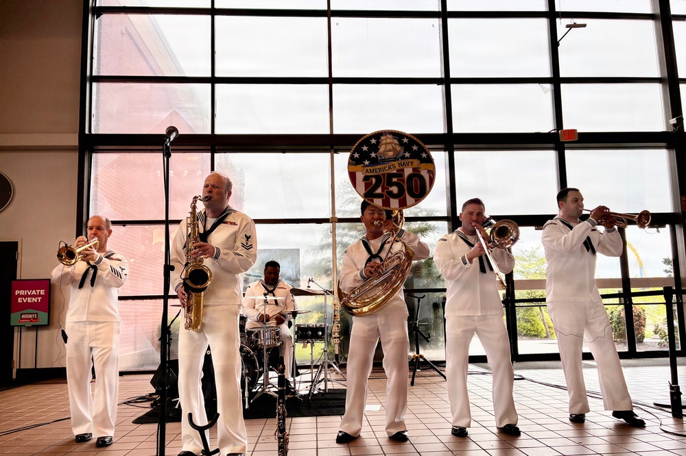 Navy Band Northeast’s Jack Tar Brass Band performs at Hershey Park Chocolate World during Harrisburg Navy Week.