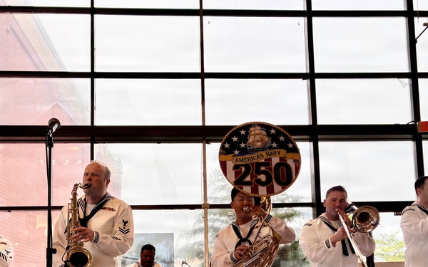 Navy Band Northeast’s Jack Tar Brass Band performs at Hershey Park Chocolate World during Harrisburg Navy Week.
