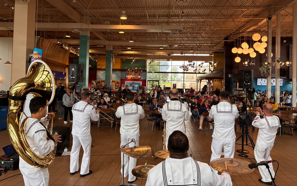 Navy Band Northeast’s Jack Tar Brass Band performs at Hershey Park Chocolate World during Harrisburg Navy Week.