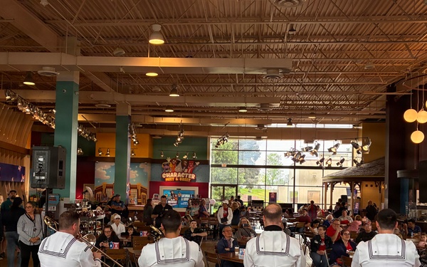 Navy Band Northeast’s Jack Tar Brass Band performs at Hershey Park Chocolate World during Harrisburg Navy Week.