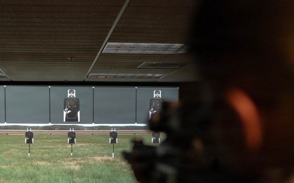 U.S. Naval Academy Midshipmen Train Indoor Simulated Marksmanship Trainer