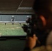 U.S. Naval Academy Midshipmen Train Indoor Simulated Marksmanship Trainer