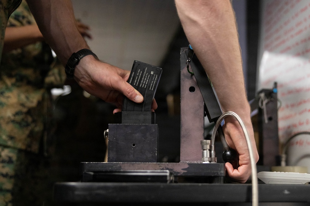 U.S. Naval Academy Midshipmen Train Indoor Simulated Marksmanship Trainer