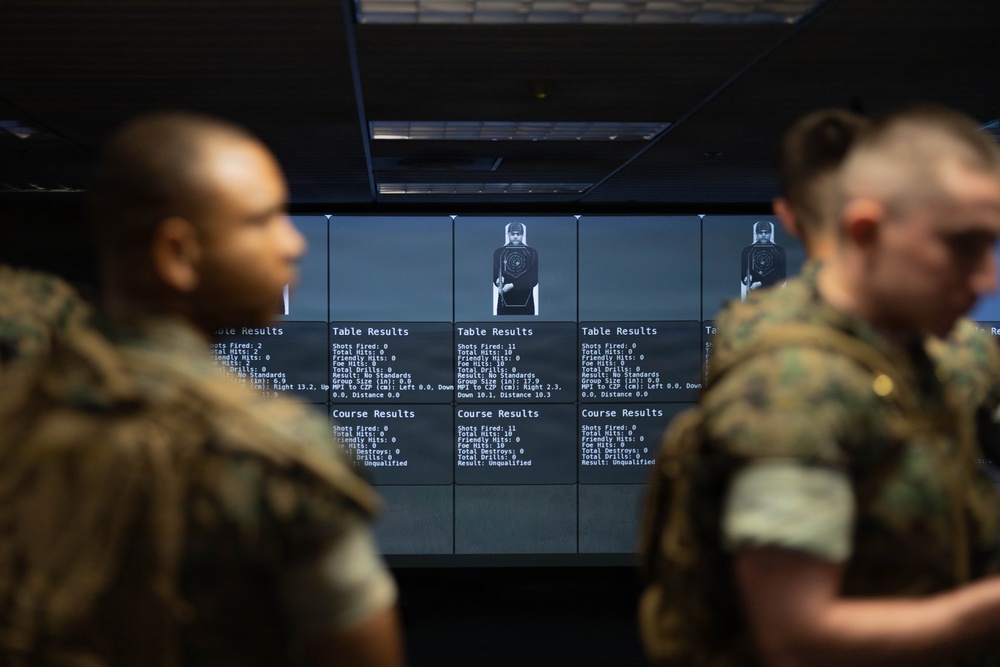 U.S. Naval Academy Midshipmen Train Indoor Simulated Marksmanship Trainer