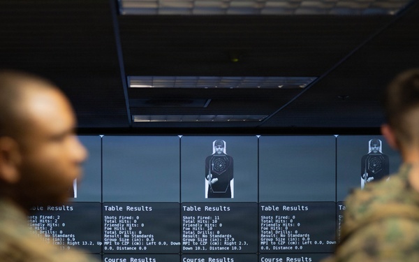 U.S. Naval Academy Midshipmen Train Indoor Simulated Marksmanship Trainer