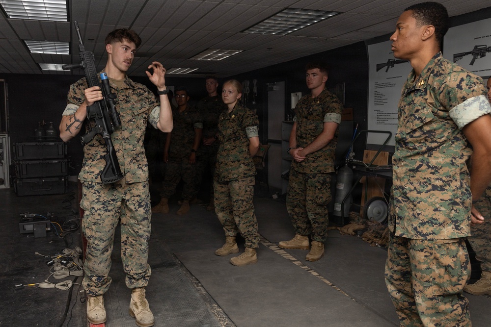 U.S. Naval Academy Midshipmen Train Indoor Simulated Marksmanship Trainer