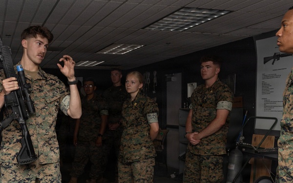 U.S. Naval Academy Midshipmen Train Indoor Simulated Marksmanship Trainer