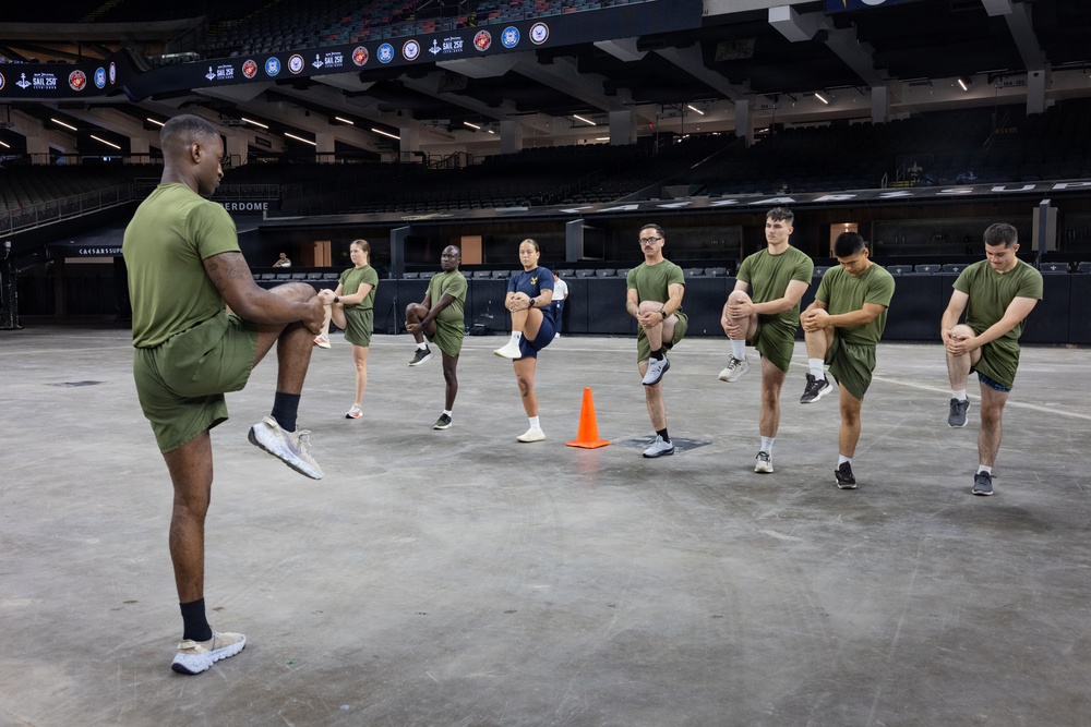 U.S. Service Members participate in Physical Training at the Ceasars Superdome in New Orleans