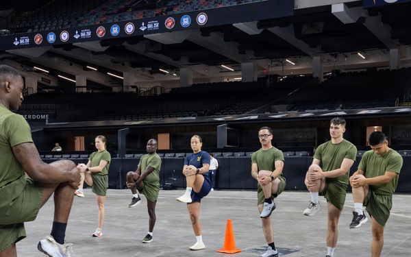 U.S. Service Members participate in Physical Training at the Ceasars Superdome in New Orleans