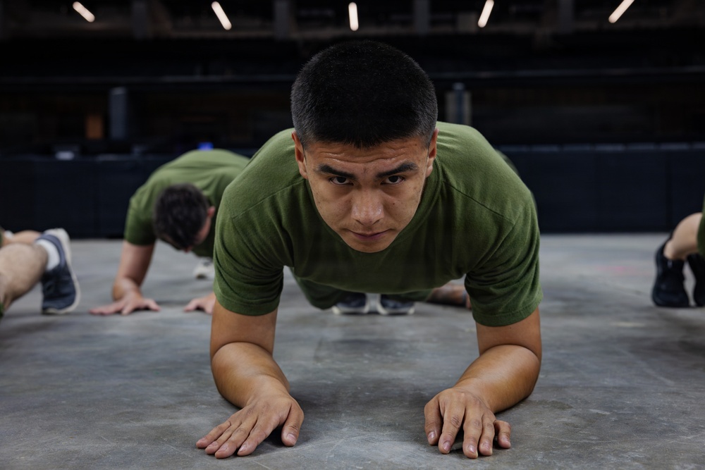 U.S. Service Members participate in Physical Training at the Ceasars Superdome in New Orleans