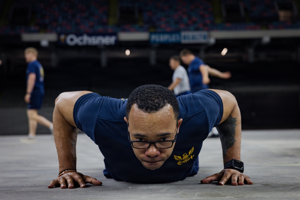 U.S. Service Members participate in Physical Training at the Ceasars Superdome in New Orleans
