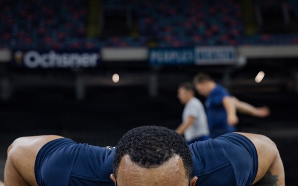 U.S. Service Members participate in Physical Training at the Ceasars Superdome in New Orleans