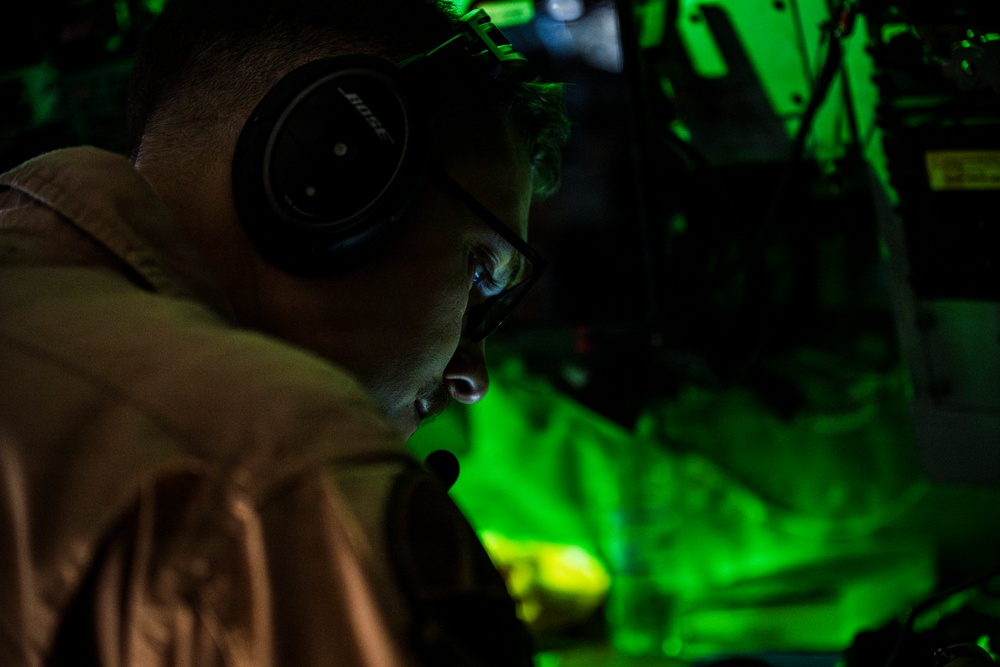 KC-135 conducts refueling operation with F-16 aircraft