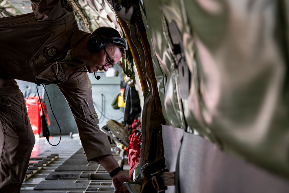KC-135 conducts refueling operation with F-16 aircraft