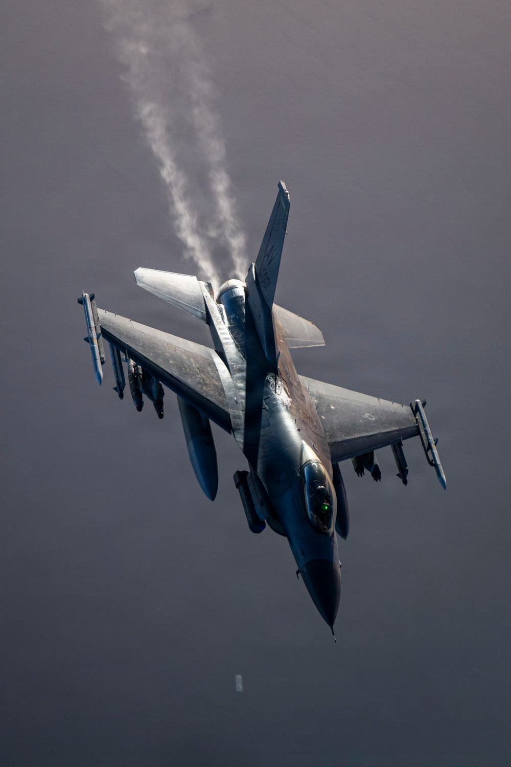 KC-135 conducts refueling operation with F-16 aircraft