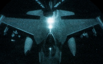 KC-135 conducts refueling operation with F-16 aircraft