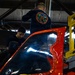 Coast Guard aircraft maintainers conduct maintenance on helicopter in Kodiak, Alaska